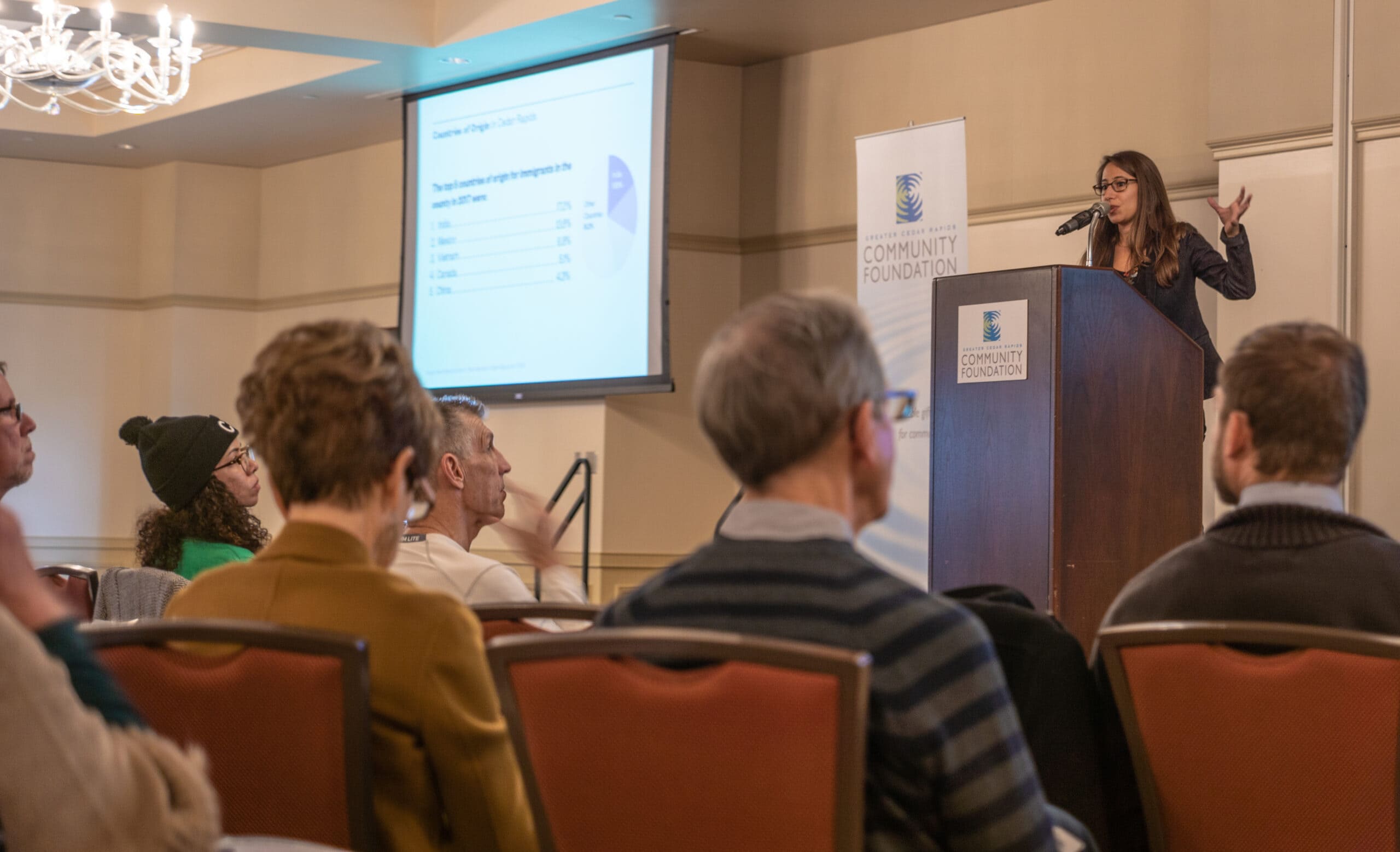 Photo of attendees listening to a Community Learning Series presentation.